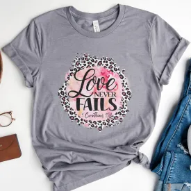 Love Never Fails Pink Leopard 1 Corinthians 13:8 Tee Shirts For Women - Christian Shirts for Women - Religious Tee Shirts