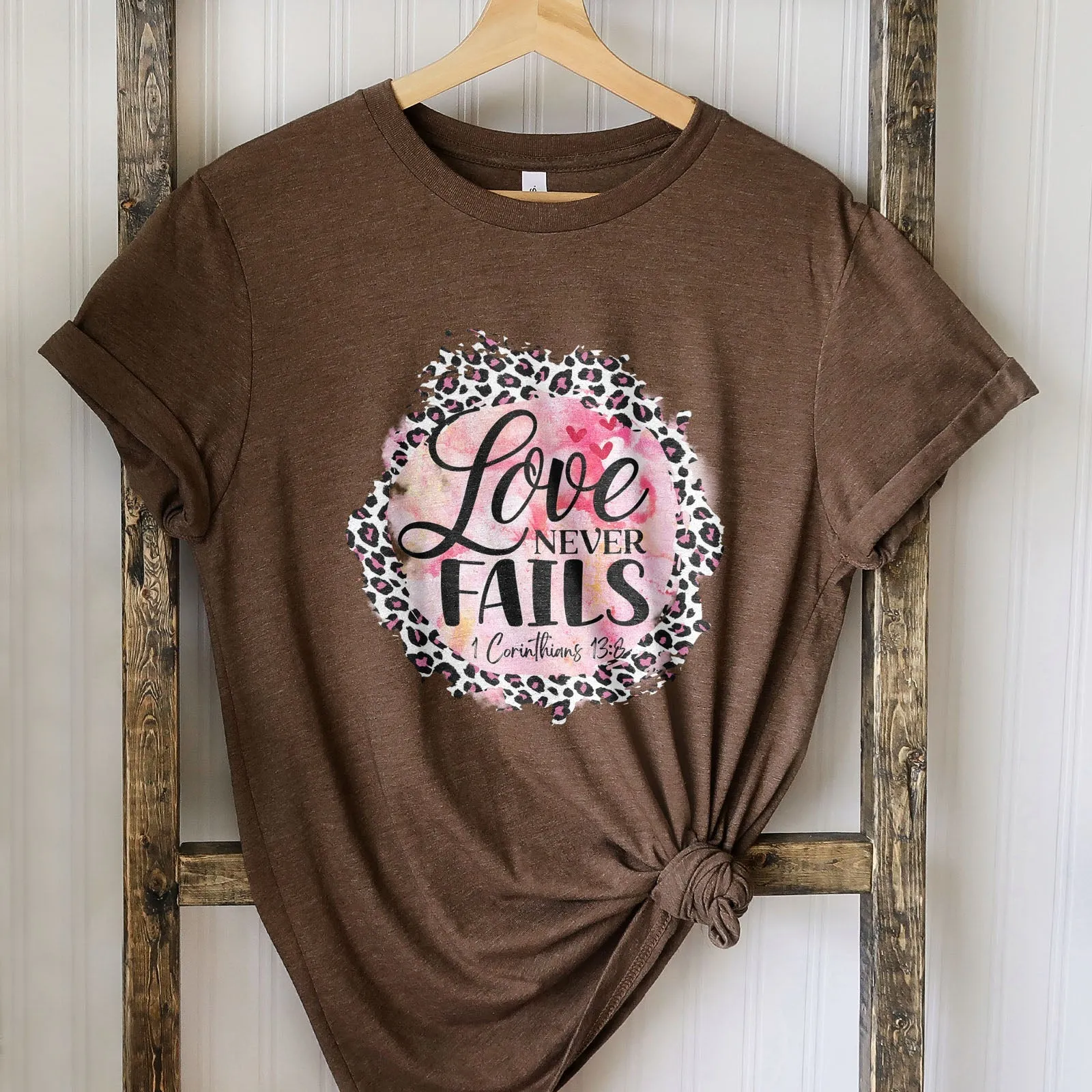 Love Never Fails Pink Leopard 1 Corinthians 13:8 Tee Shirts For Women - Christian Shirts for Women - Religious Tee Shirts