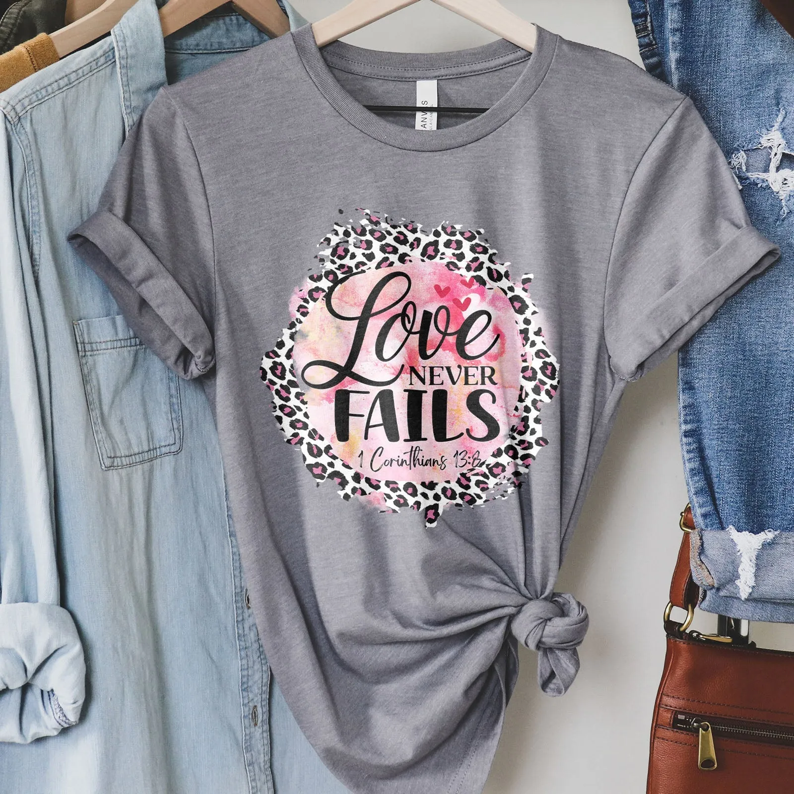 Love Never Fails Pink Leopard 1 Corinthians 13:8 Tee Shirts For Women - Christian Shirts for Women - Religious Tee Shirts