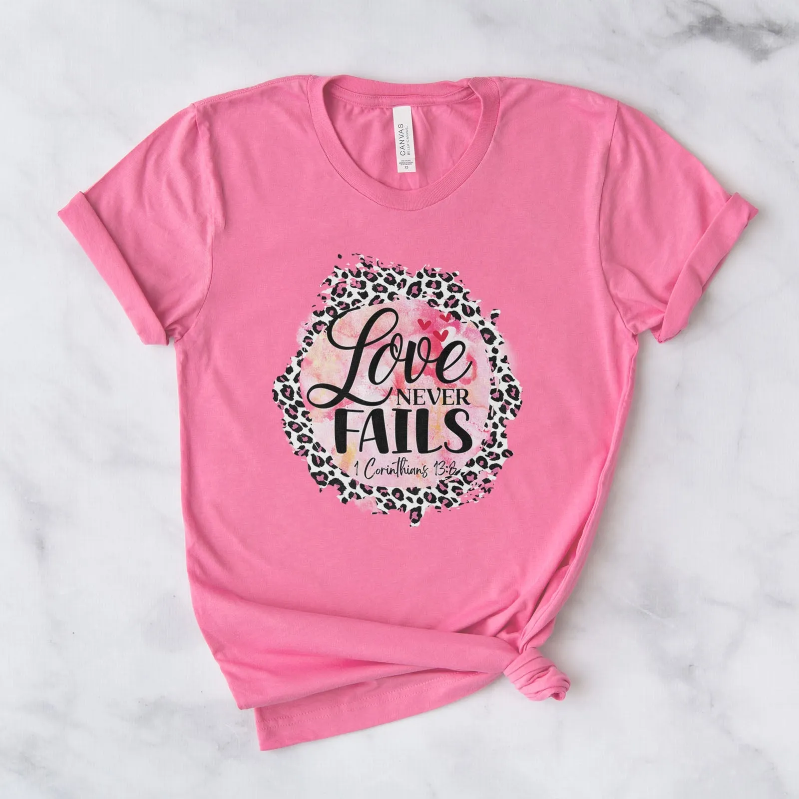 Love Never Fails Pink Leopard 1 Corinthians 13:8 Tee Shirts For Women - Christian Shirts for Women - Religious Tee Shirts